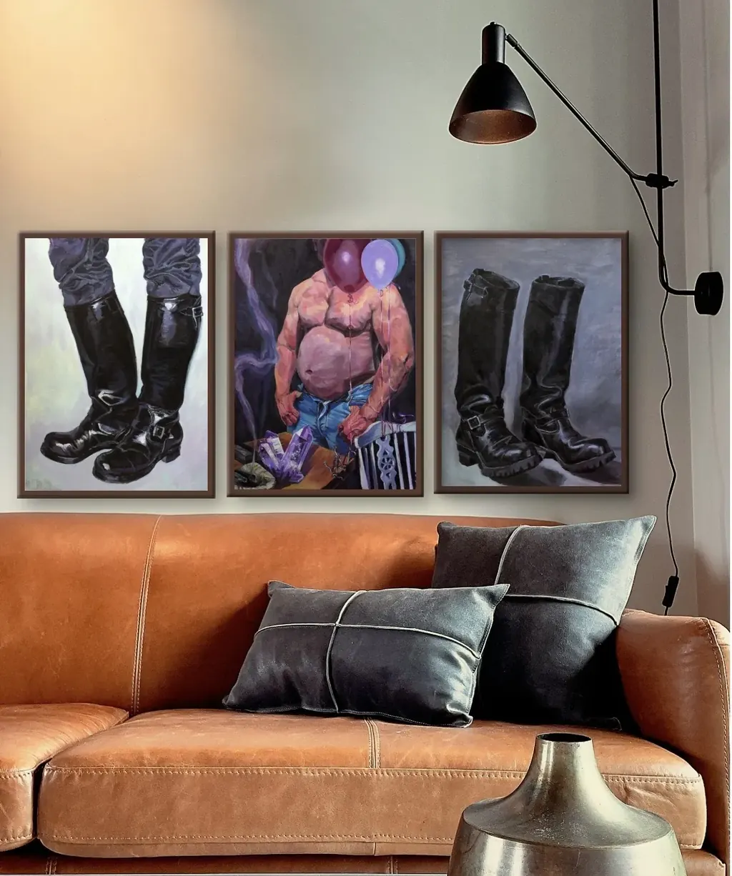 Artist in studio surrounded by paintings from the Charged Things collection